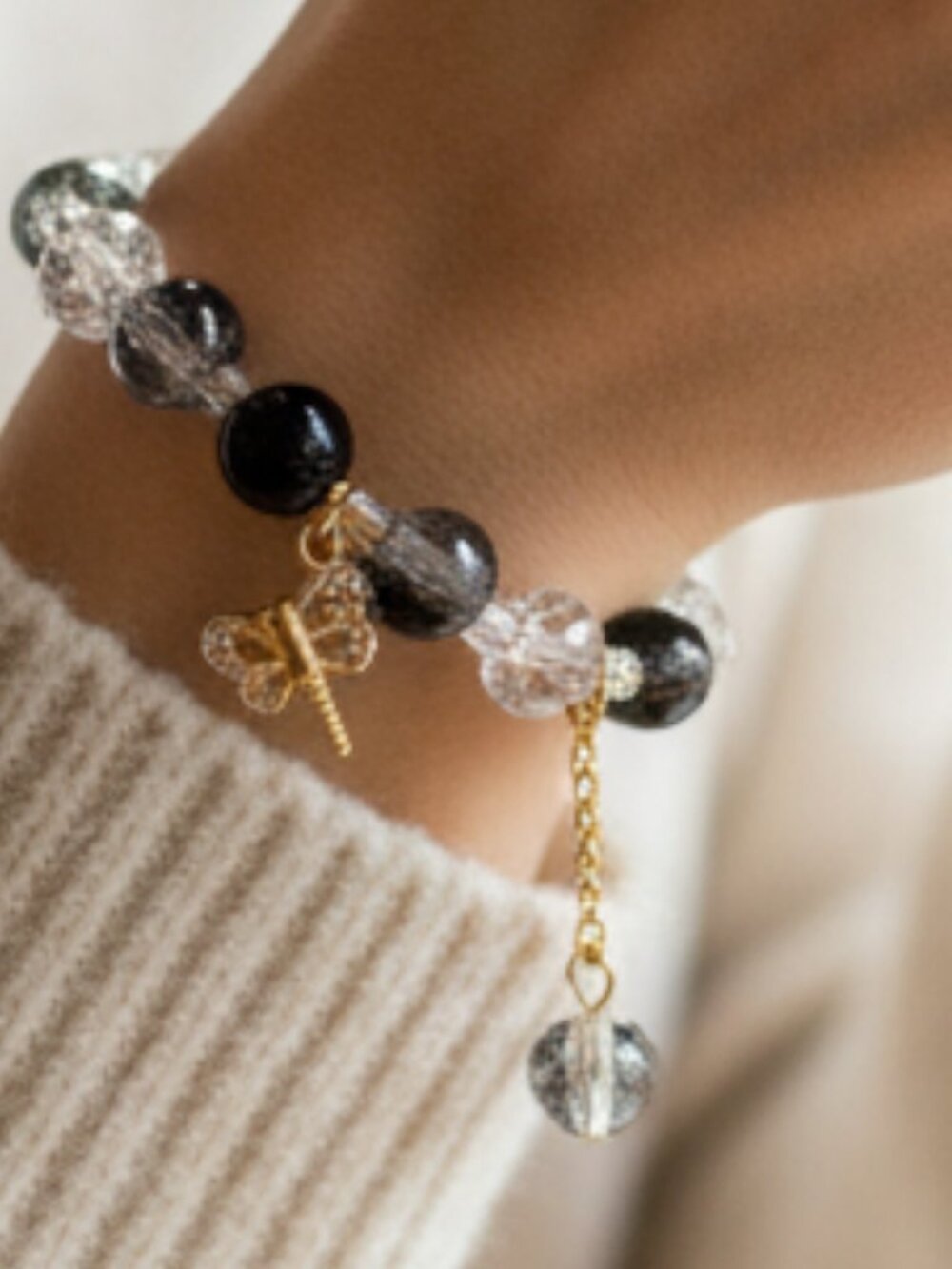 Elegant Black Crystal Beaded Bracelet with Gold Butterfly Charm